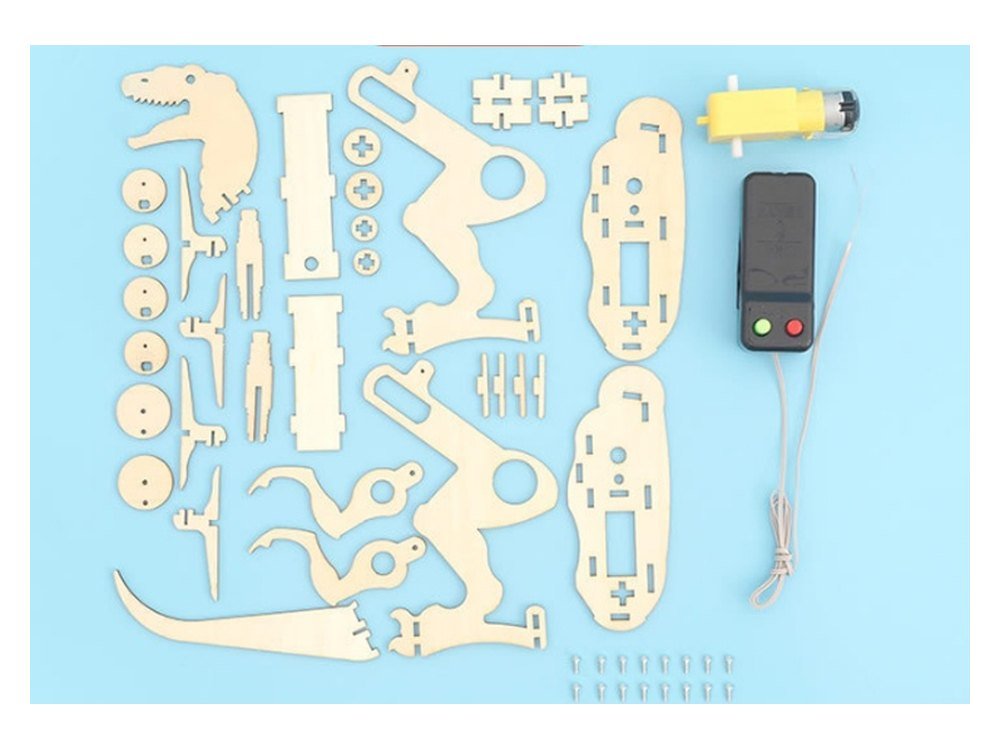 The Mechanical T-Rex kit as supplied, with every plywood piece, the gearmotor, the controller and the screws laid out
