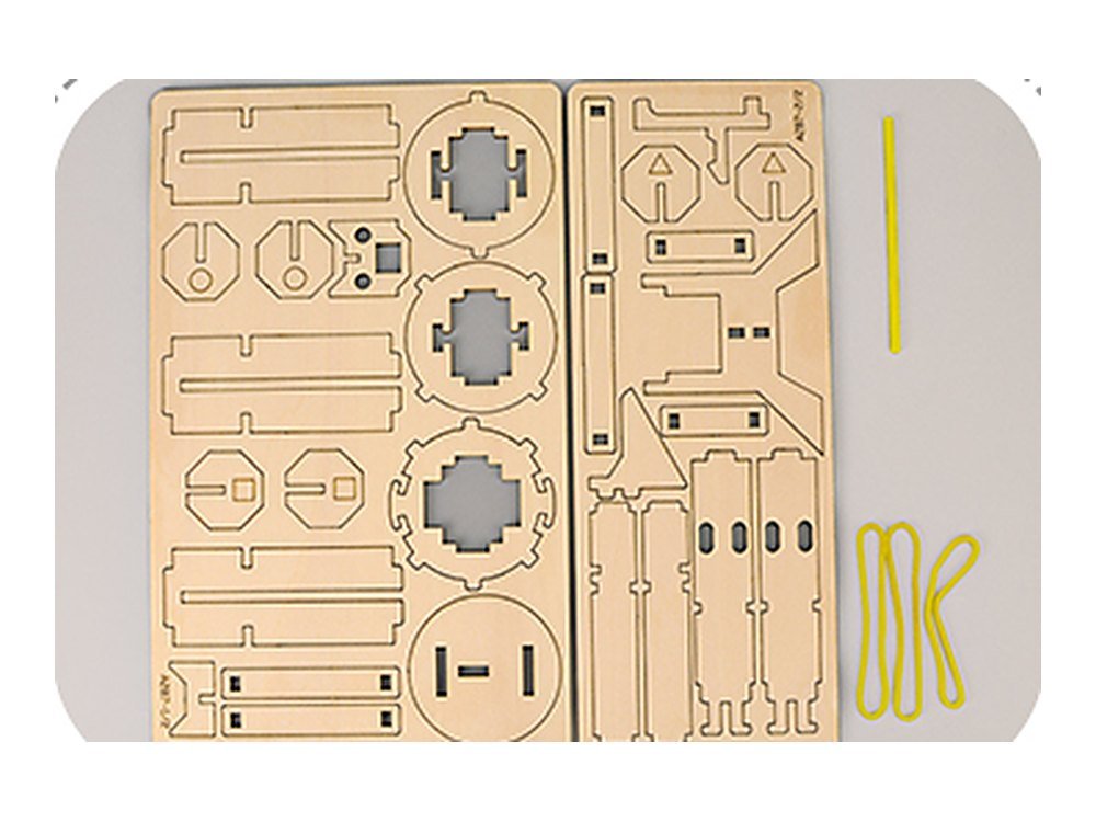 The Mortar Launcher kit as supplied: two laser-cut plywood sheets, three rubber bands and a color stick
