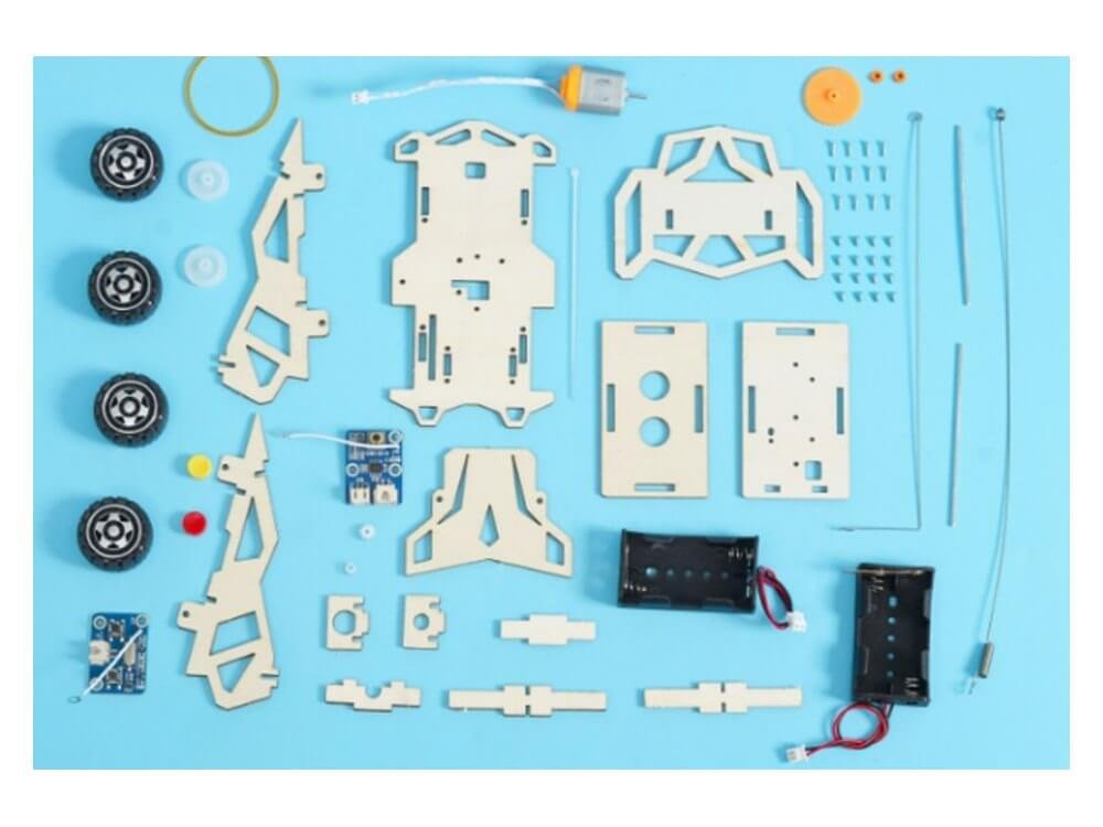 The Remote Control Racing Car kit as supplied, with every plate, wheel, board and fitting laid out
