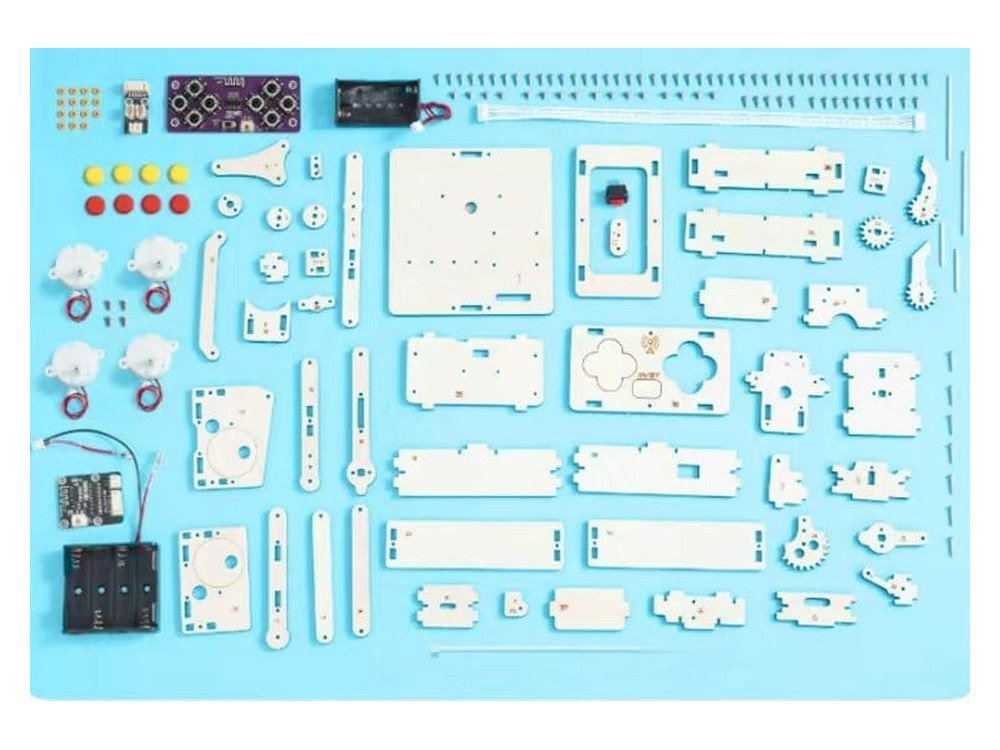 The Robotic Arm kit as supplied, with every plywood plate, the four gear motors, radio boards, battery boxes, shafts and screws laid out