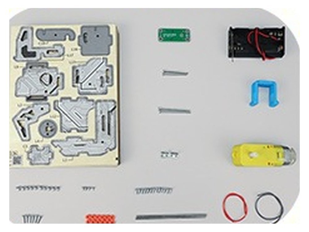 The Voice Activated Mechanical Dog kit as supplied, with the printed plywood board, sound module, motor, battery box, shafts, sleeves, wires and screws